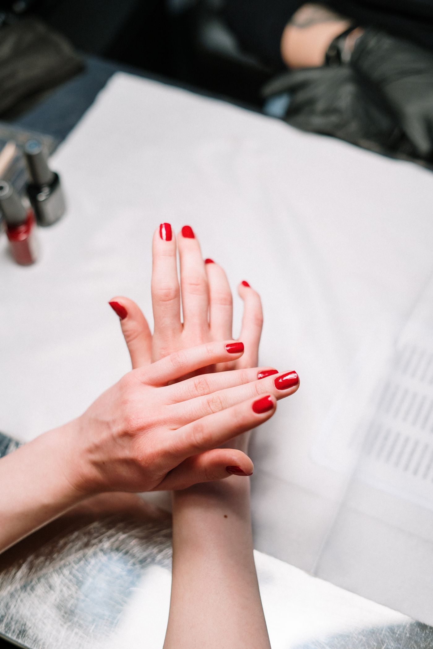 Freshly polished red manicure