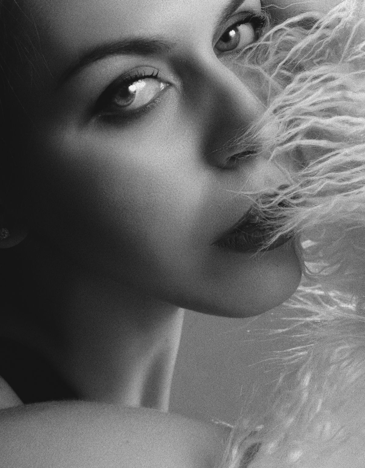 Editorial black and white close-up of a client's finished look